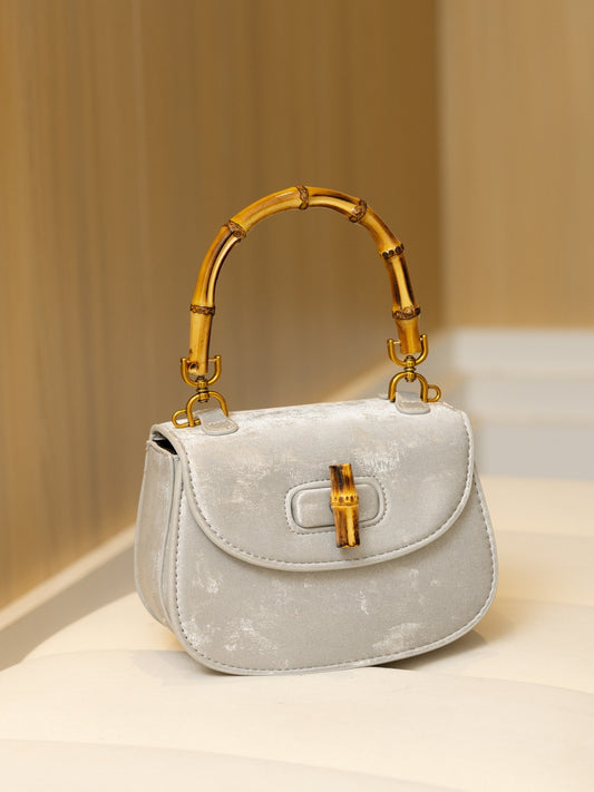 Bolso de mano estilo occidental con estructura de bambú, versátil, tipo bandolera
