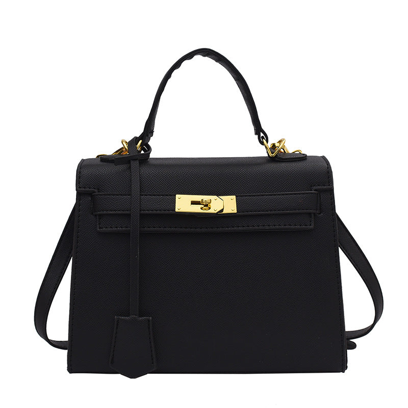 Bolso Kelly de PU color caramelo, cruzado de hombro