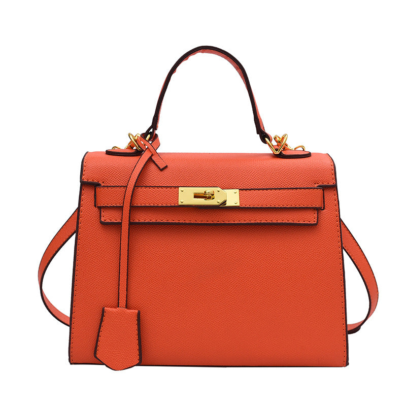 Bolso Kelly de PU color caramelo, cruzado de hombro