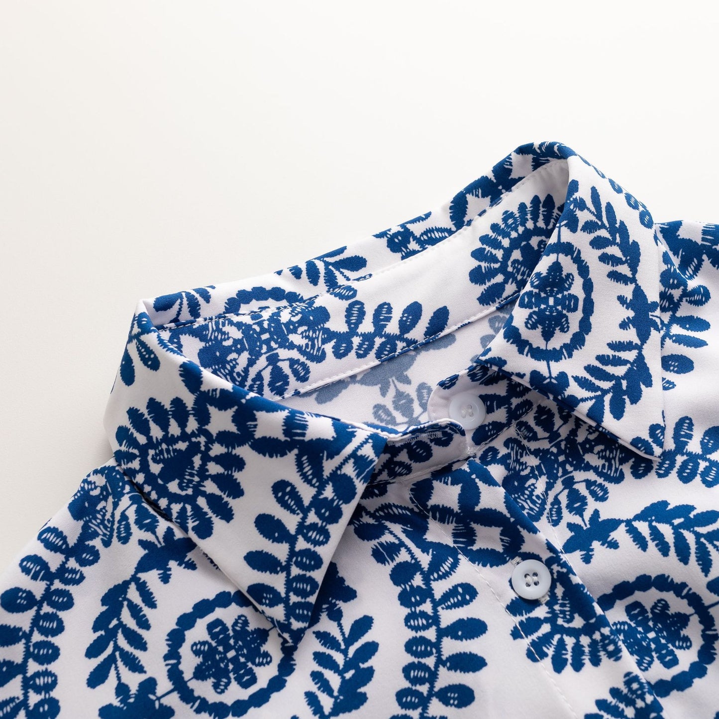 Mono camisero estampado con mangas de murciélago y botones