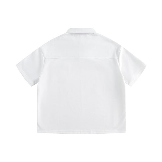 Polo holgado de manga corta con bolsillo de parche y diseño de patchwork con bloqueo de color para hombre