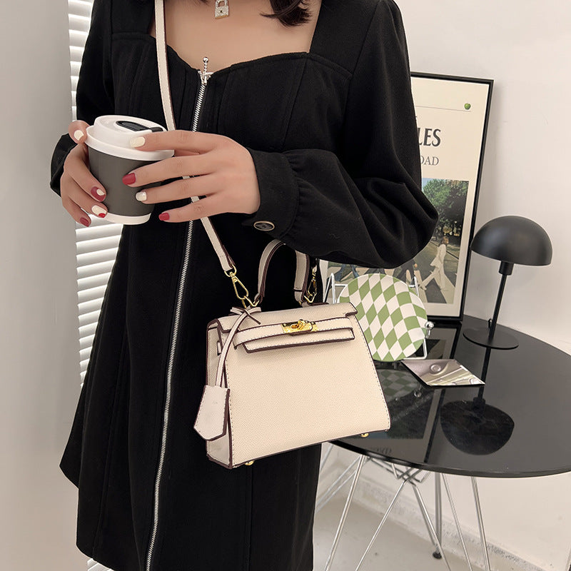 Bolso Kelly de PU color caramelo, cruzado de hombro