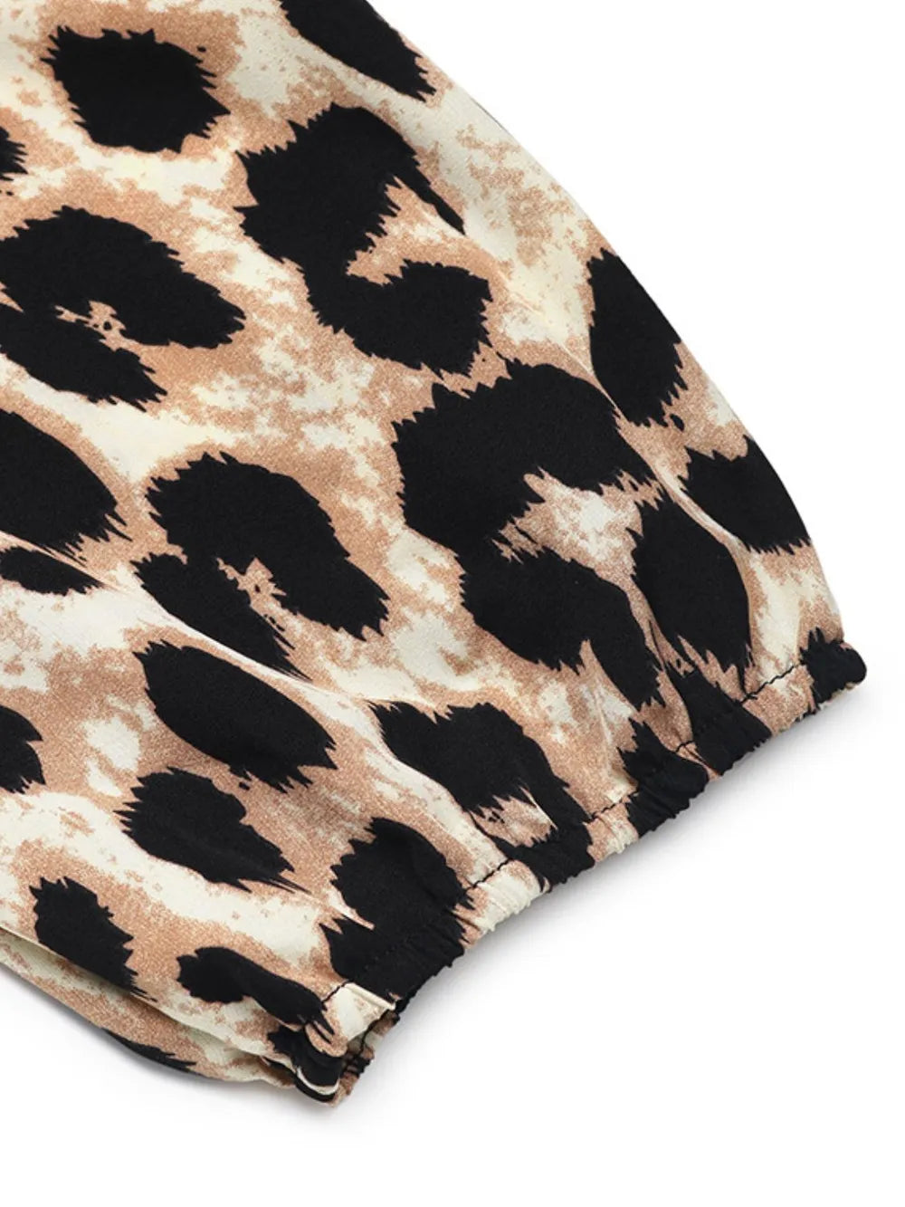 Pantalones de mono con estampado de leopardo de cintura alta, versátiles y modernos.