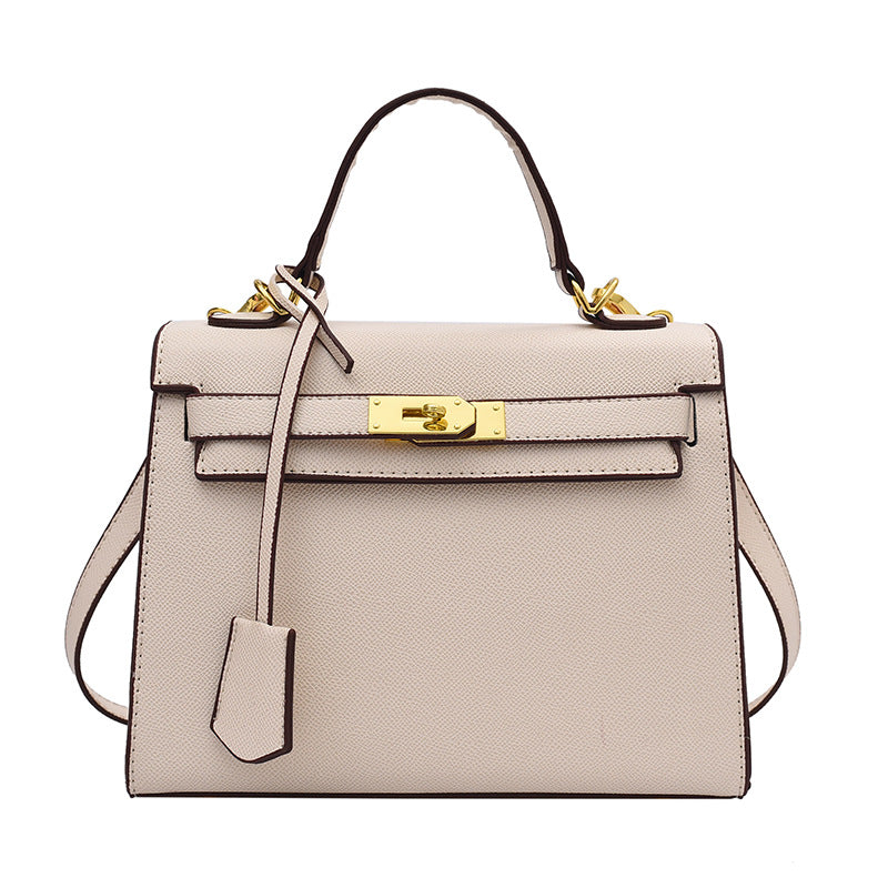 Bolso Kelly de PU color caramelo, cruzado de hombro