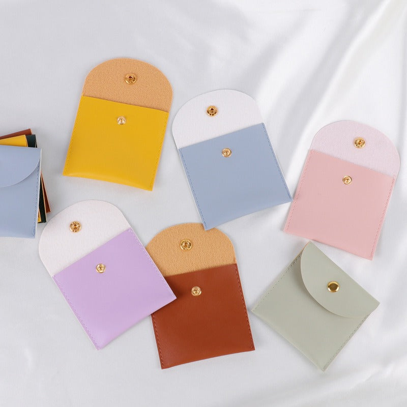 Cartera monedero con hebilla de cuero