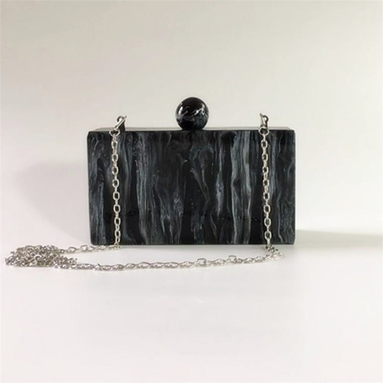 Bolso de mano acrílico con cabeza redonda y grano de mármol, moderno y versátil, color negro