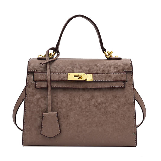Bolso Kelly de PU color caramelo, cruzado de hombro