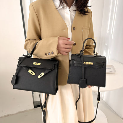 Bolso Kelly de PU color caramelo, cruzado de hombro