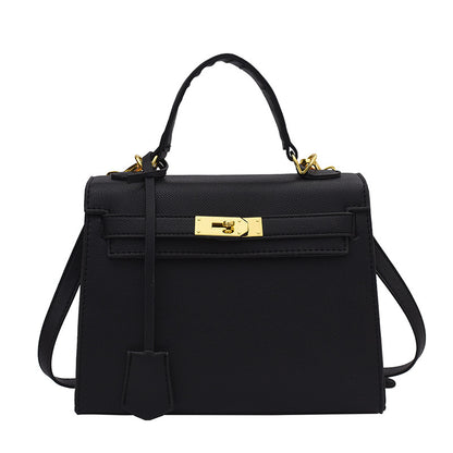Bolso Kelly de PU color caramelo, cruzado de hombro