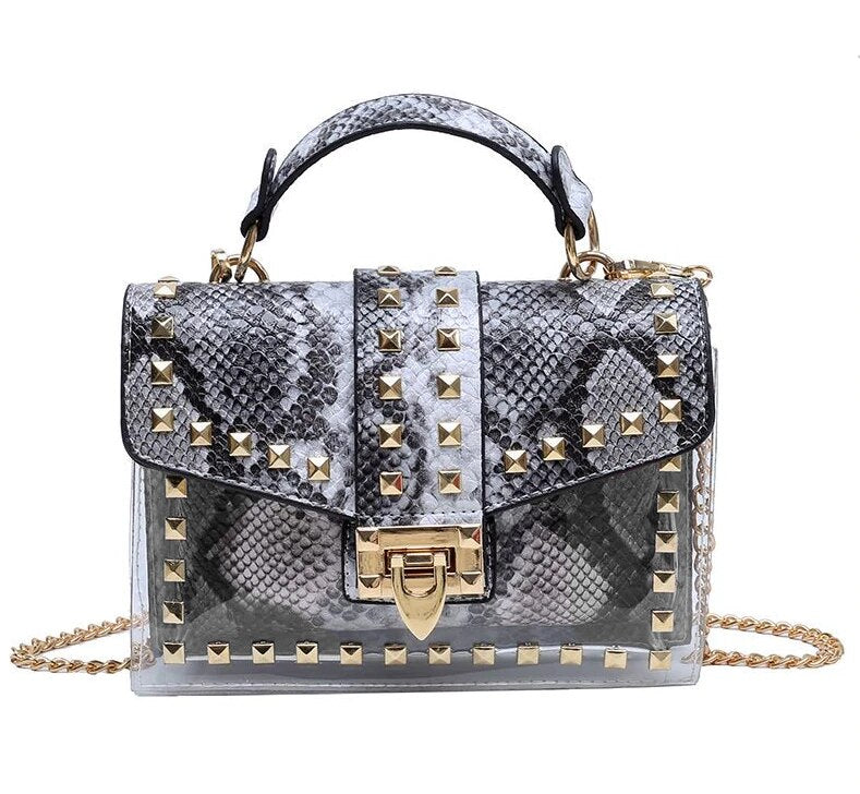Bolso de mano elegante con remaches y nuevas cadenas para mujer