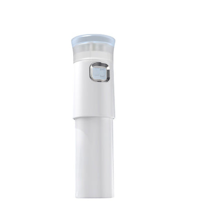 Dispositivo de medicina para el cuero cabelludo. Aporta líquido para el cuidado del cabello, peine medicinal