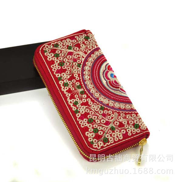 Monederos bordados para mujer