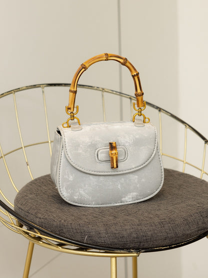Bolso de mano estilo occidental con estructura de bambú, versátil, tipo bandolera