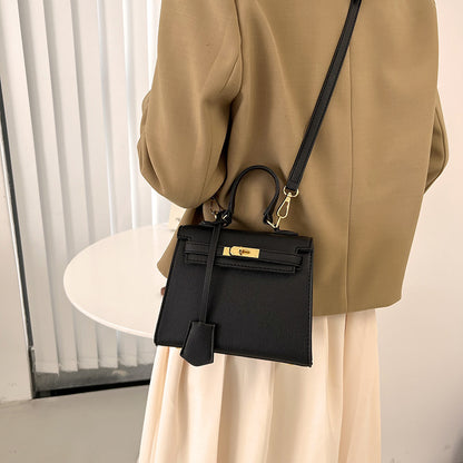 Bolso Kelly de PU color caramelo, cruzado de hombro