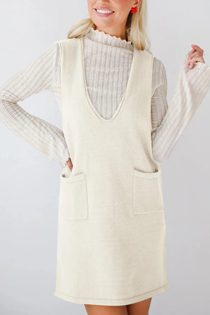 Vestido tipo jersey mini con cuello en V