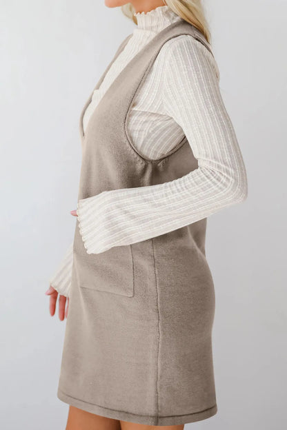 Vestido tipo jersey mini con cuello en V