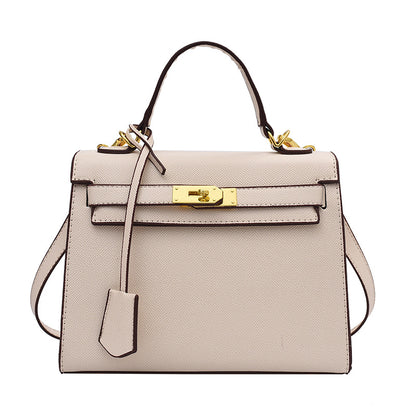 Bolso Kelly de PU color caramelo, cruzado de hombro