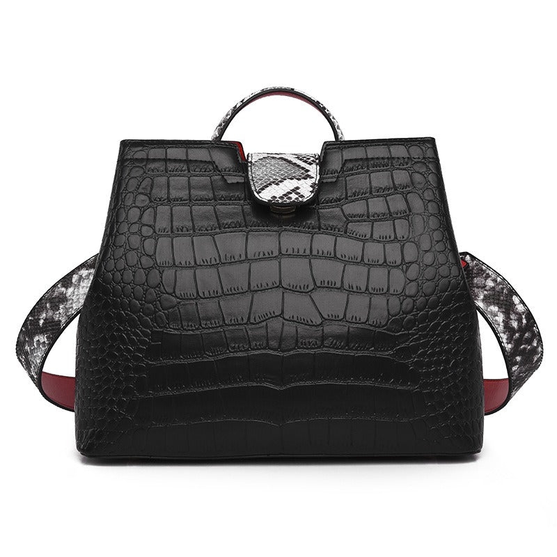 Bolso de mujer con textura de cocodrilo