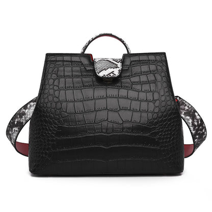 Bolso de mujer con textura de cocodrilo
