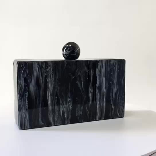 Bolso de mano acrílico con cabeza redonda y grano de mármol, moderno y versátil, color negro